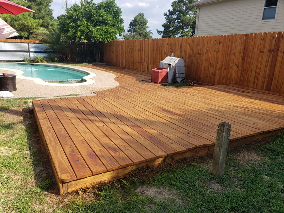 Backyard with Wooden Deck and Fence