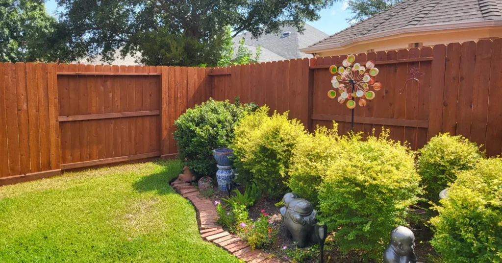 Well-prepared backyard ready for fence staining Sugar Land TX