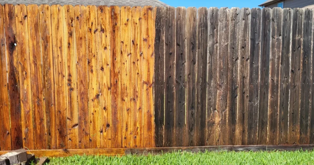 Before and after fence staining in Towne Lake showing weathered fence transformed with Baker Gray Away stain