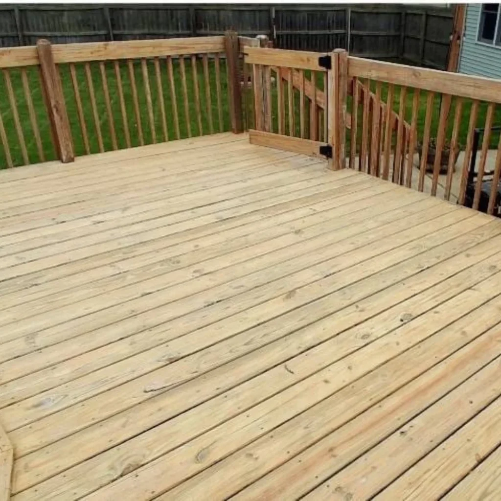 New wood deck before staining Houston showing fresh natural pine planks and railings residential construction ready for professional stain application protection