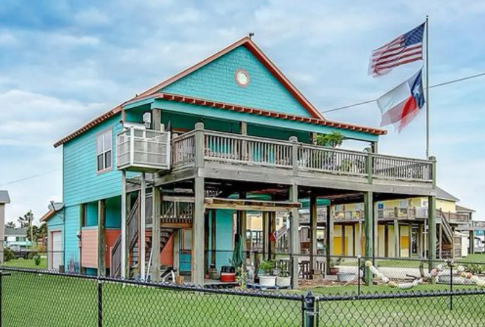 weathered-deck-before-staining-texas-beach-house Weathered gray deck posts and railings on elevated Texas beach house before professional deck staining restoration