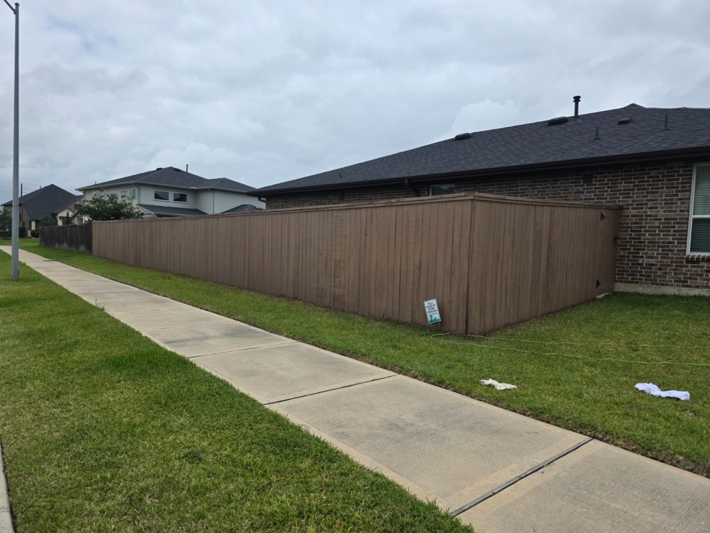 Tamarron HOA Fence Stained in Katy, Sherwin-Williams Color 3 Tamarron Katy fence after Sherwin-Williams SuperDeck Semi-Solid staining by Ninja Fence Staining