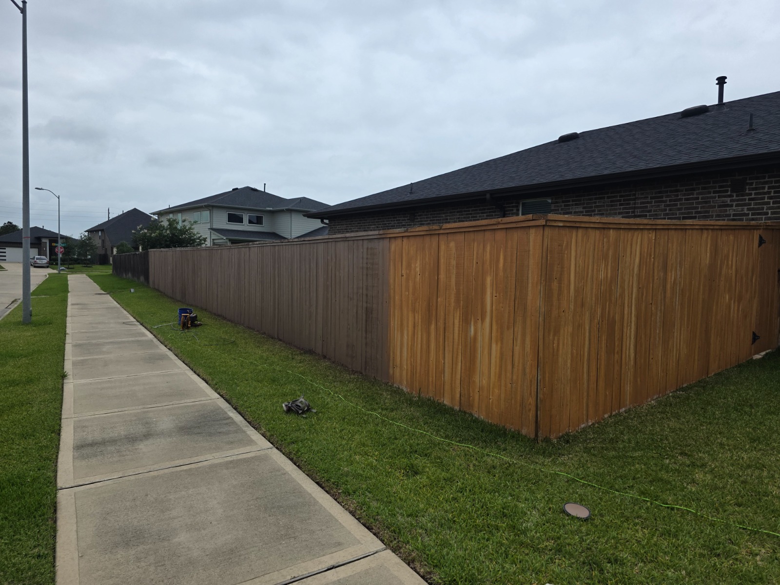 Tamarron HOA Fence Stained in Katy, Sherwin-Williams Color 1 Tamarron HOA fence in Katy TX stained with Sherwin-Williams SuperDeck Semi-Solid by Ninja Fence Staining